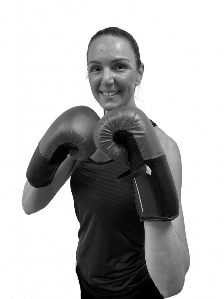 coach nutrition avec gants de boxe